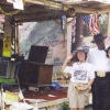 Maxwell St. stage before the Fall, 2000, with bluesman Jimmy Lee Robinson and Japanese filmmaker